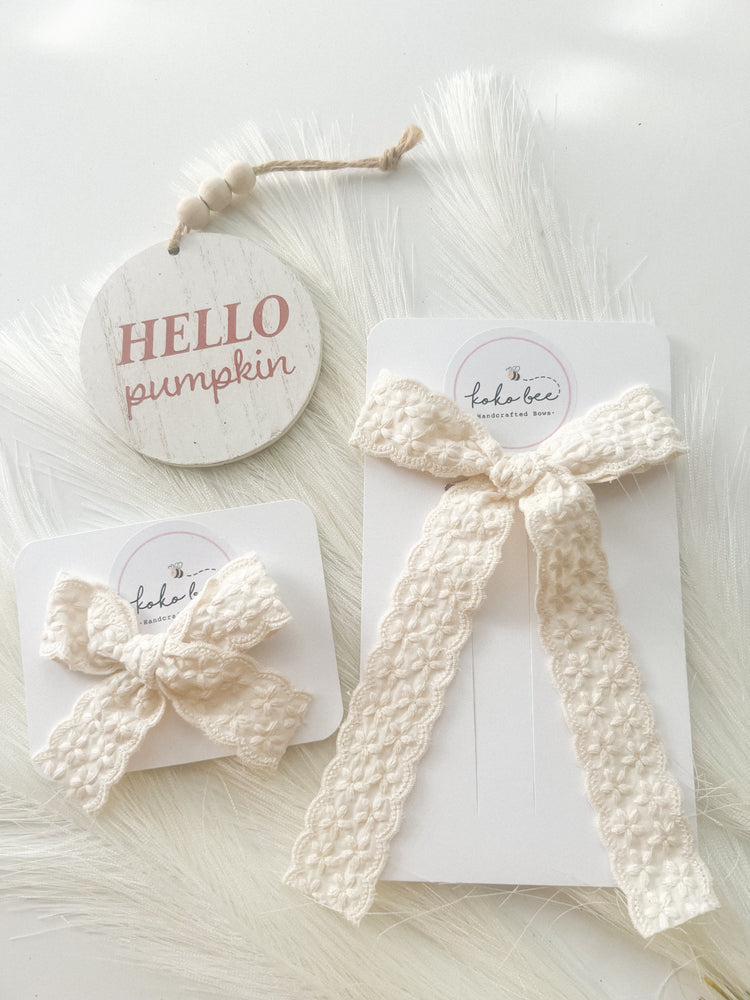 Ivory Embroidered Bows