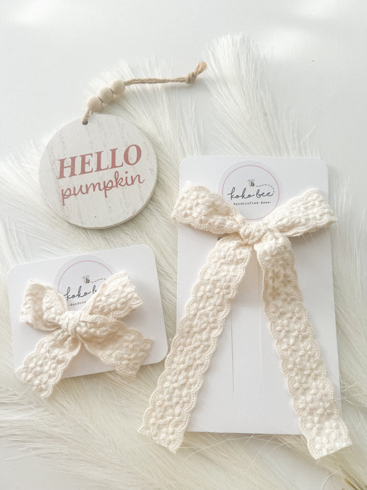 Ivory Embroidered Bows