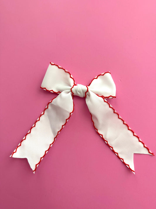 White Ribbon Bow w/ Red Scallop Edge